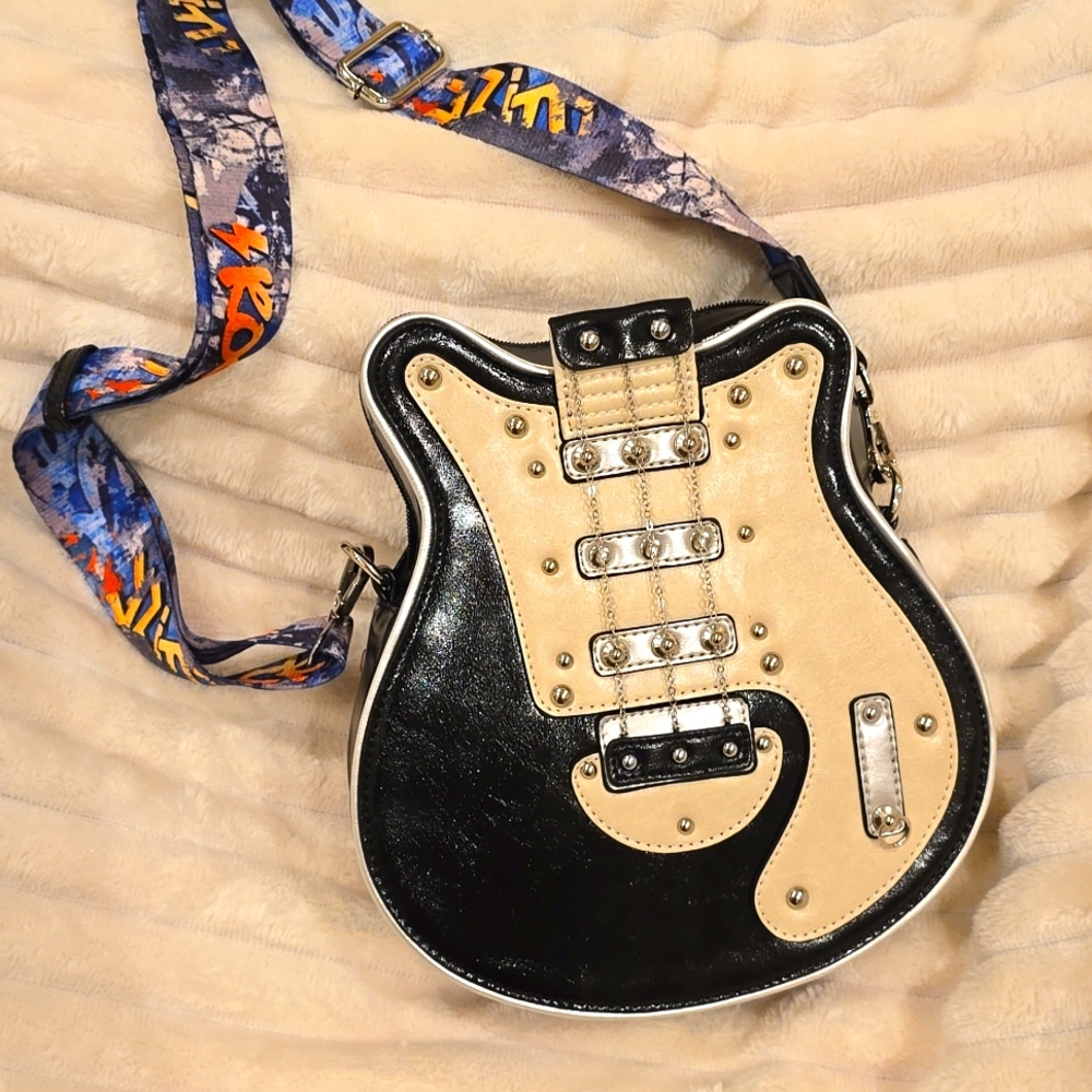 Guitar-Shaped Black and Silver Crossbody Bag Tablet and Control not Inclued